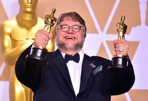 Guillermo del Torro with his Oscars